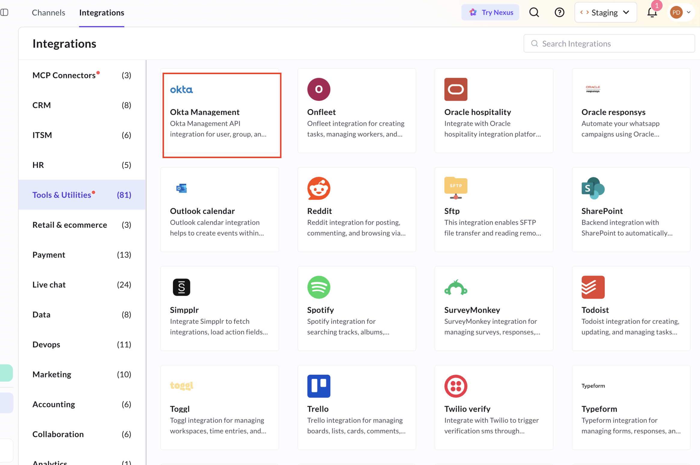 Okta Management integration setup screen in Yellow.ai showing the Domain URL and API Token fields